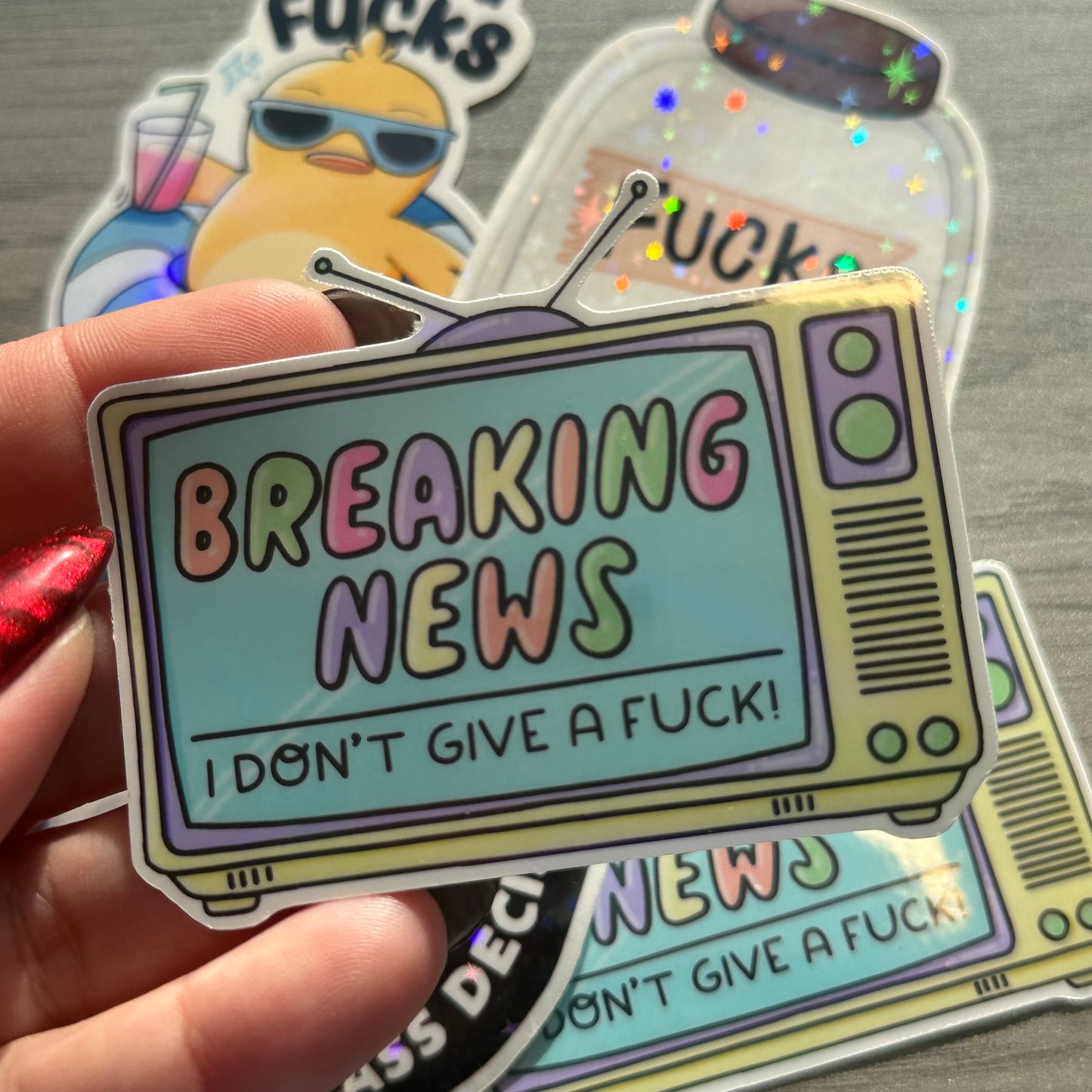 Breaking New IDGAF Vinyl Sticker