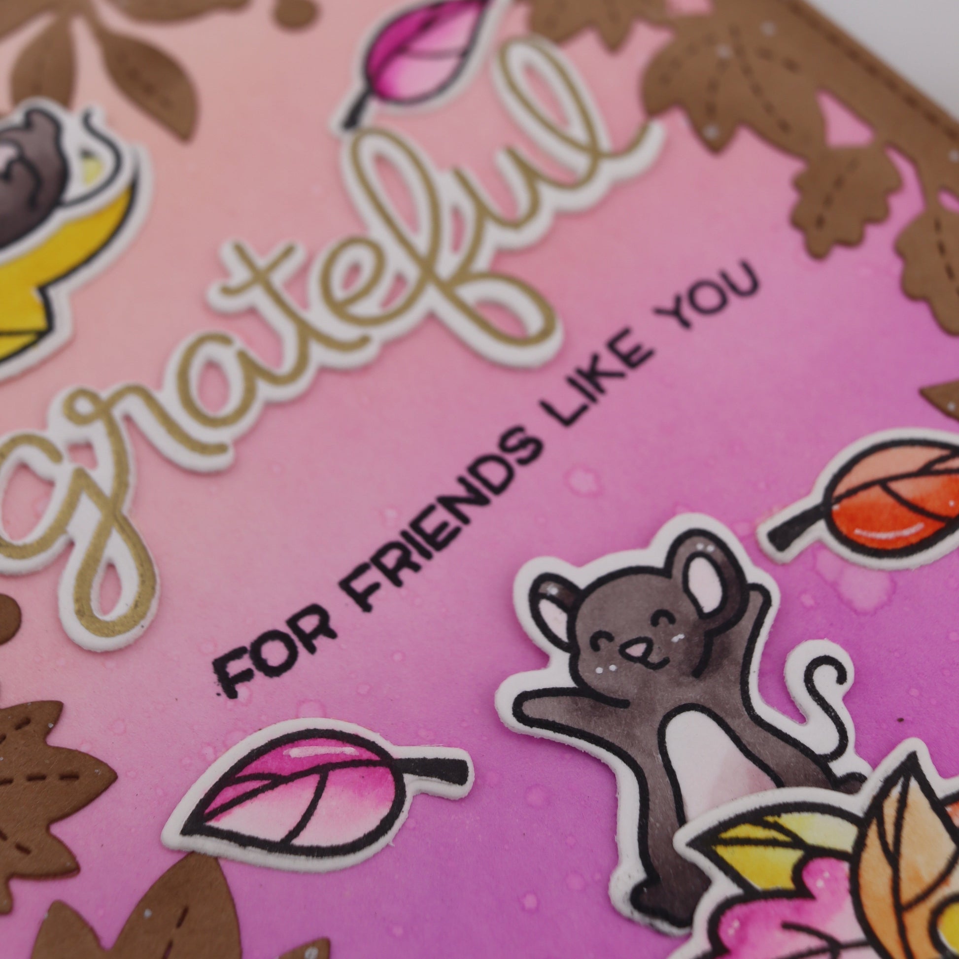 Card with 'grateful for friends like you' text and cartoon animals on a pink background