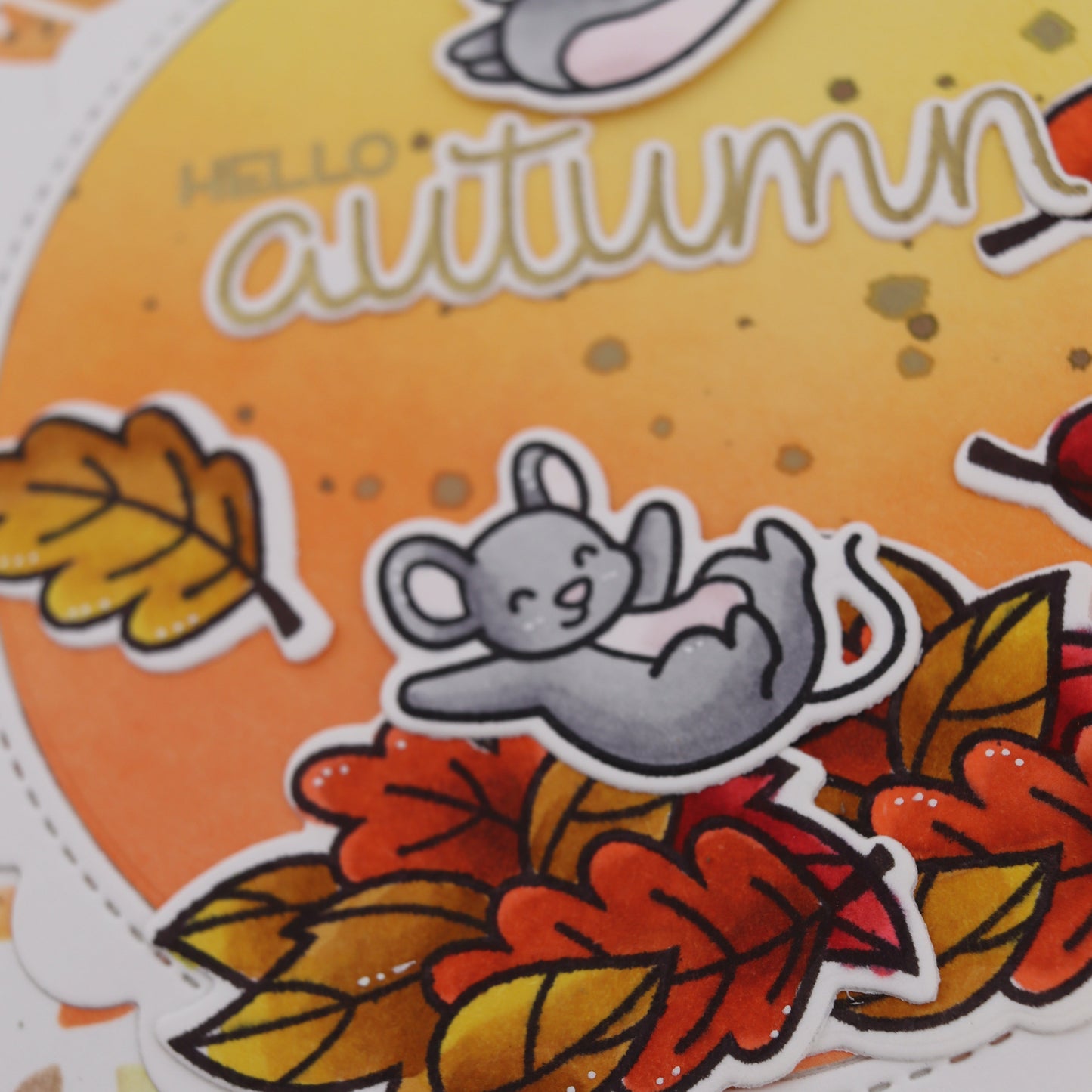 Autumn-themed stickers with leaves and animals on a colorful background