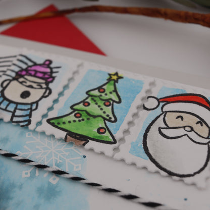 Decorative Christmas-themed stamps with a Santa Claus design on a white background.