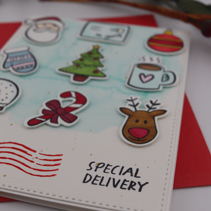 Christmas-themed card with stickers on a white background