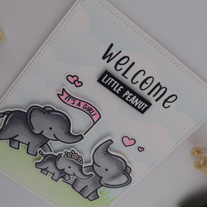 Baby shower card with elephants and 'Welcome Little Peanut' text on a light background