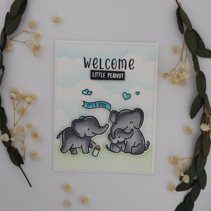 Card with baby elephant illustration and 'Welcome Little Peanut' text on a decorative background with flowers and leaves.