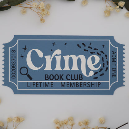 Blue ticket-style card for Crime Book Club lifetime membership on a white background with flowers and leaves.