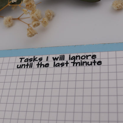 Floral arrangement on a grid paper with text and a ruler