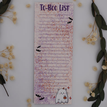 To-Do list with cat design on a white surface with decorative elements